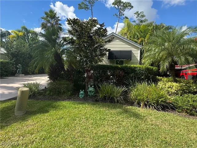 a view of fountain in front of house