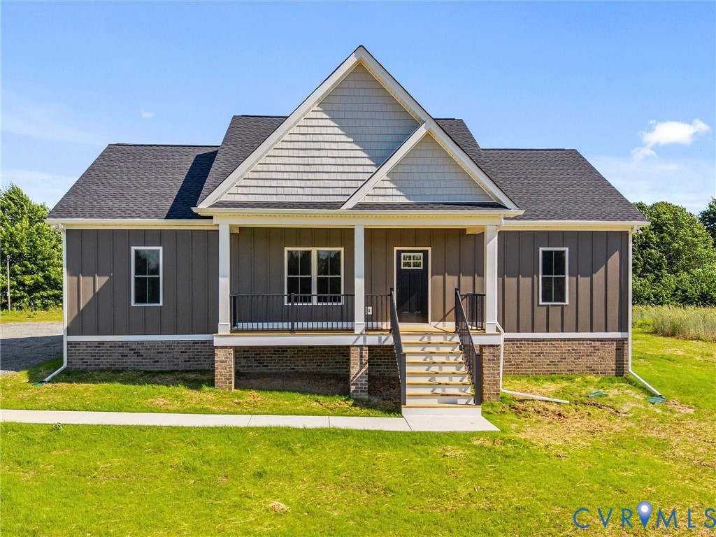 3289 Cumberland Road Cumberland, VA 23040 - Photo 1 of 29 a front view of a house with a yard