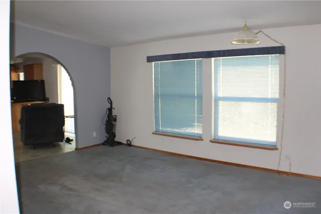 an empty room with windows