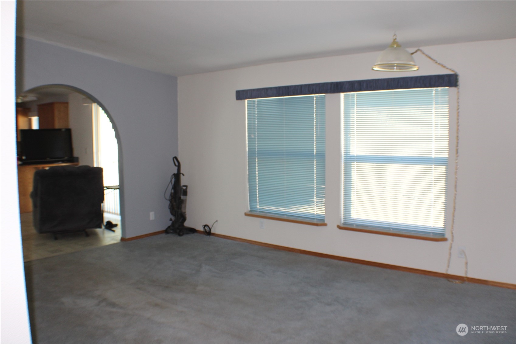 110 Bartroff Road Oroville, WA 98844 - Photo 19 of 38 an empty room with windows and closet