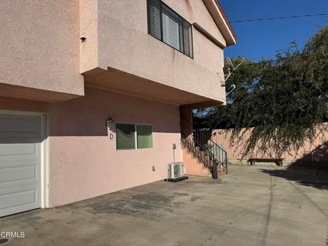 a view of garage and deck