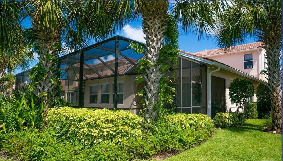 13644 Manchester Lane Naples, FL 34109 - Photo 4 of 18 a view of a house with a tree