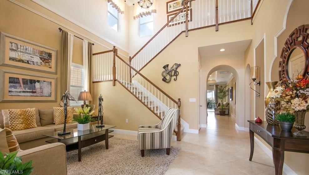 13644 Manchester Lane Naples, FL 34109 - Photo 6 of 18 a living room with furniture and a potted plant