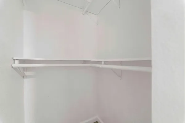 a close up view of racks on the wall