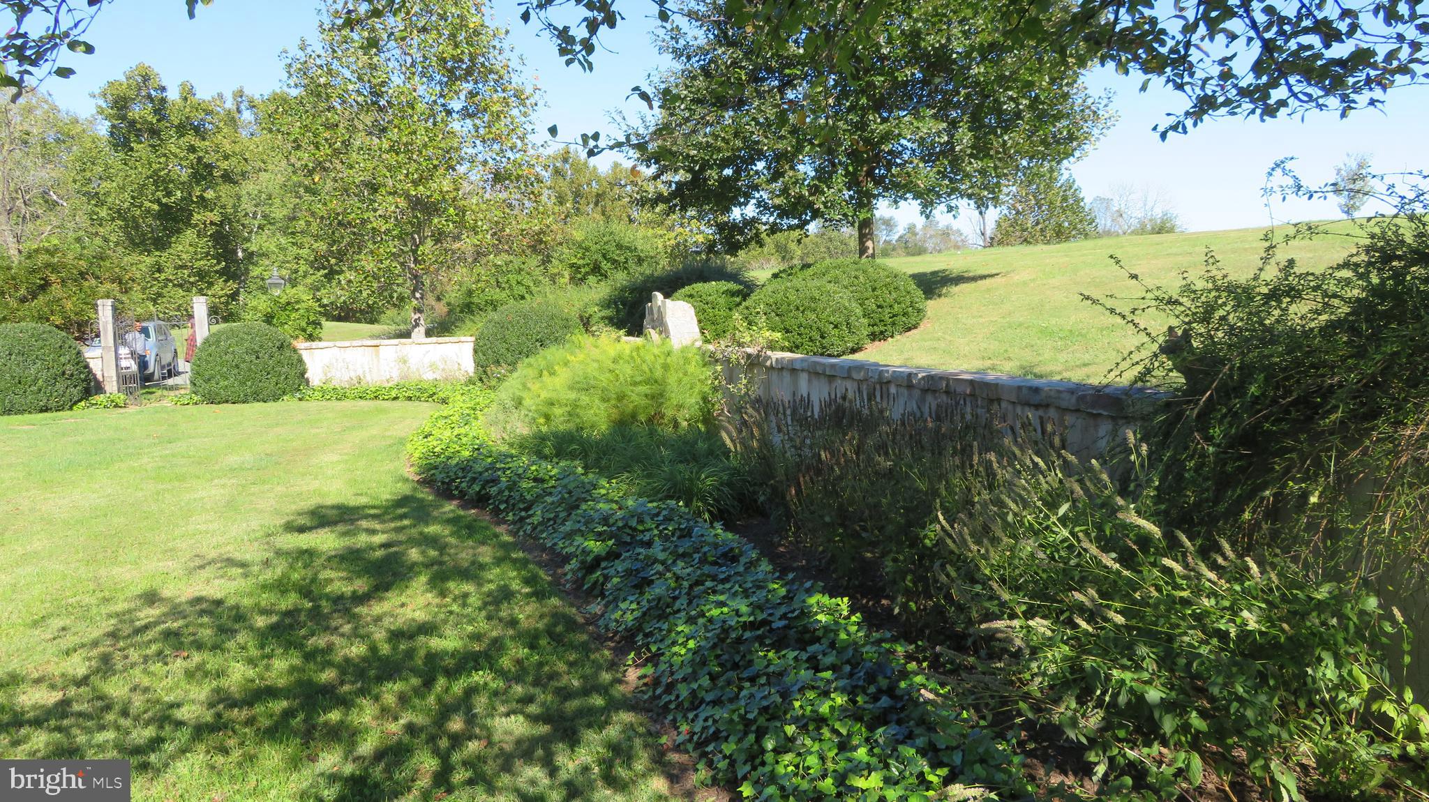 5790 Leeds Manor Road Hume, VA 22639 - Photo 6 of 61 Walled garden in front of house