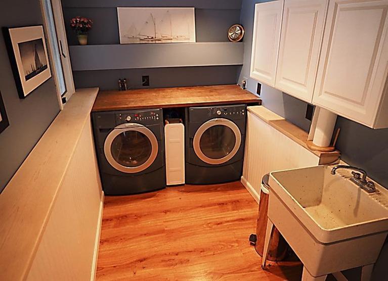 580 Lumbert Mill Road Centerville, MA 02632 - Photo 30 of 34 a utility room with dryer and washer