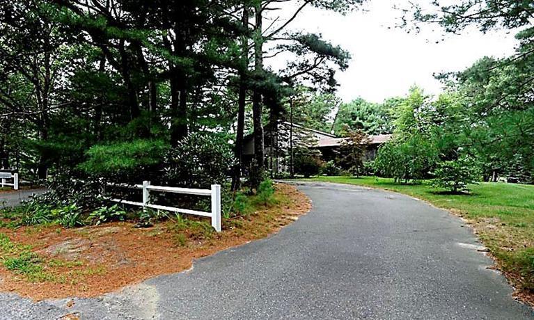580 Lumbert Mill Road Centerville, MA 02632 - Photo 5 of 34 a view of a park with large trees