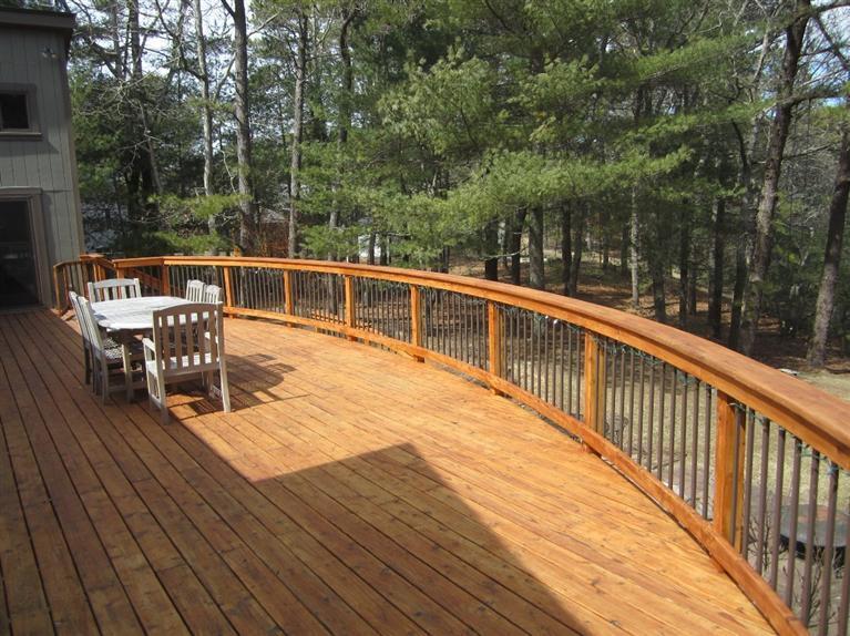 580 Lumbert Mill Road Centerville, MA 02632 - Photo 9 of 34 a view of a balcony with chairs