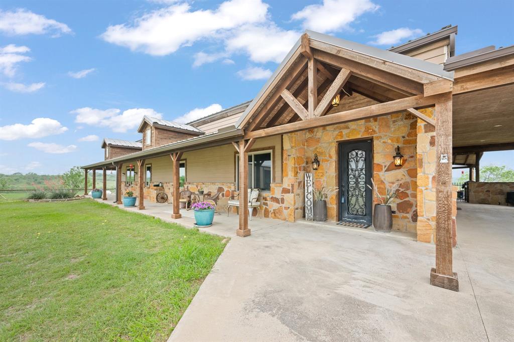 290 Barton Road Maypearl, TX 76064 - Photo 1 of 34 a view of a house with yard and porch