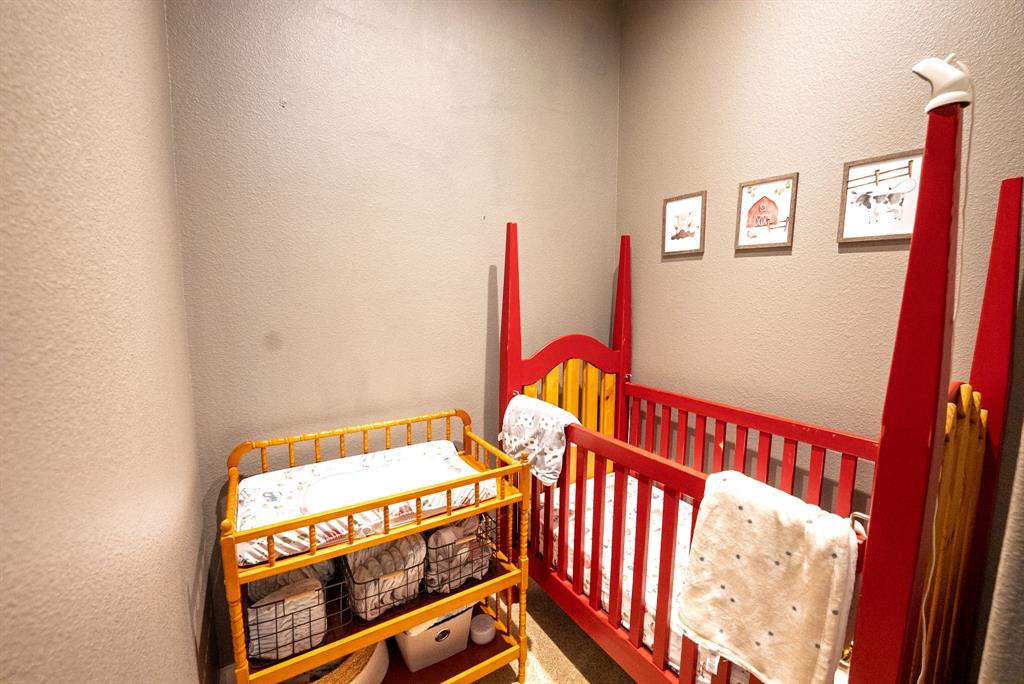 290 Barton Road Maypearl, TX 76064 - Photo 18 of 32 a view of a staircase with white walls