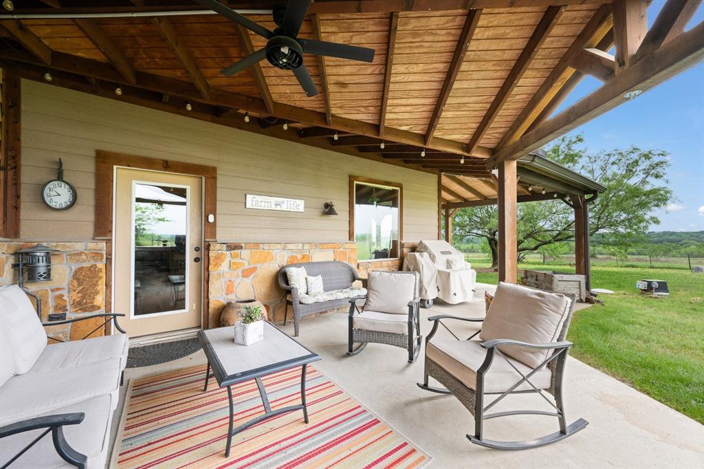 290 Barton Road Maypearl, TX 76064 - Photo 21 of 34 a outdoor space with patio lots of furniture and garden view
