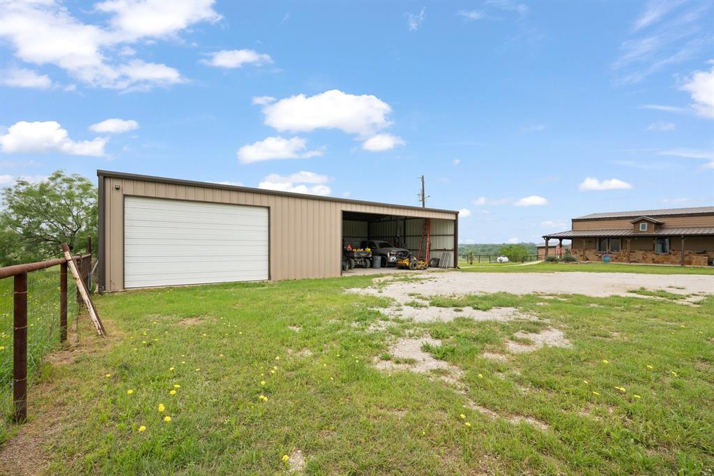 290 Barton Road Maypearl, TX 76064 - Photo 29 of 34 a view of kitchen and entertaining space