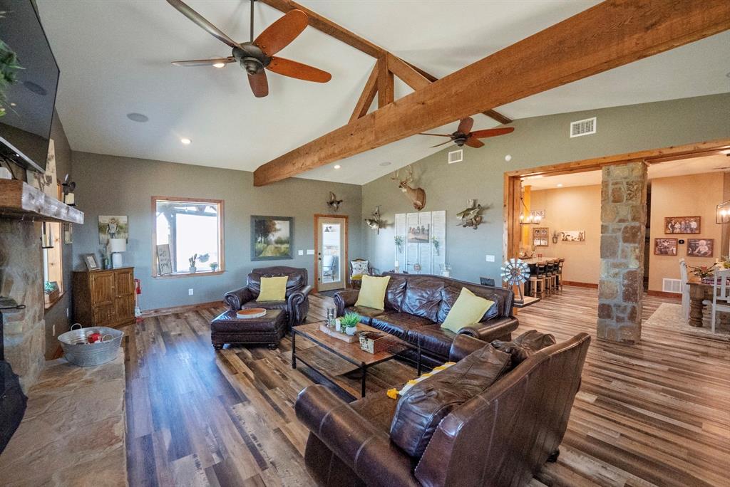 290 Barton Road Maypearl, TX 76064 - Photo 6 of 32 a living room with furniture and wooden floor