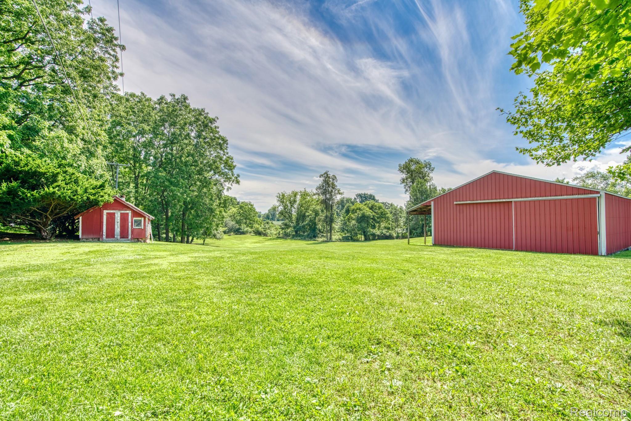 4065 Jewell Road Howell, MI 48843 - Photo 53 of 62 POLE BARN HAS DIRT FLOOR AND COULD HAVE HORSE STALLS SET UP