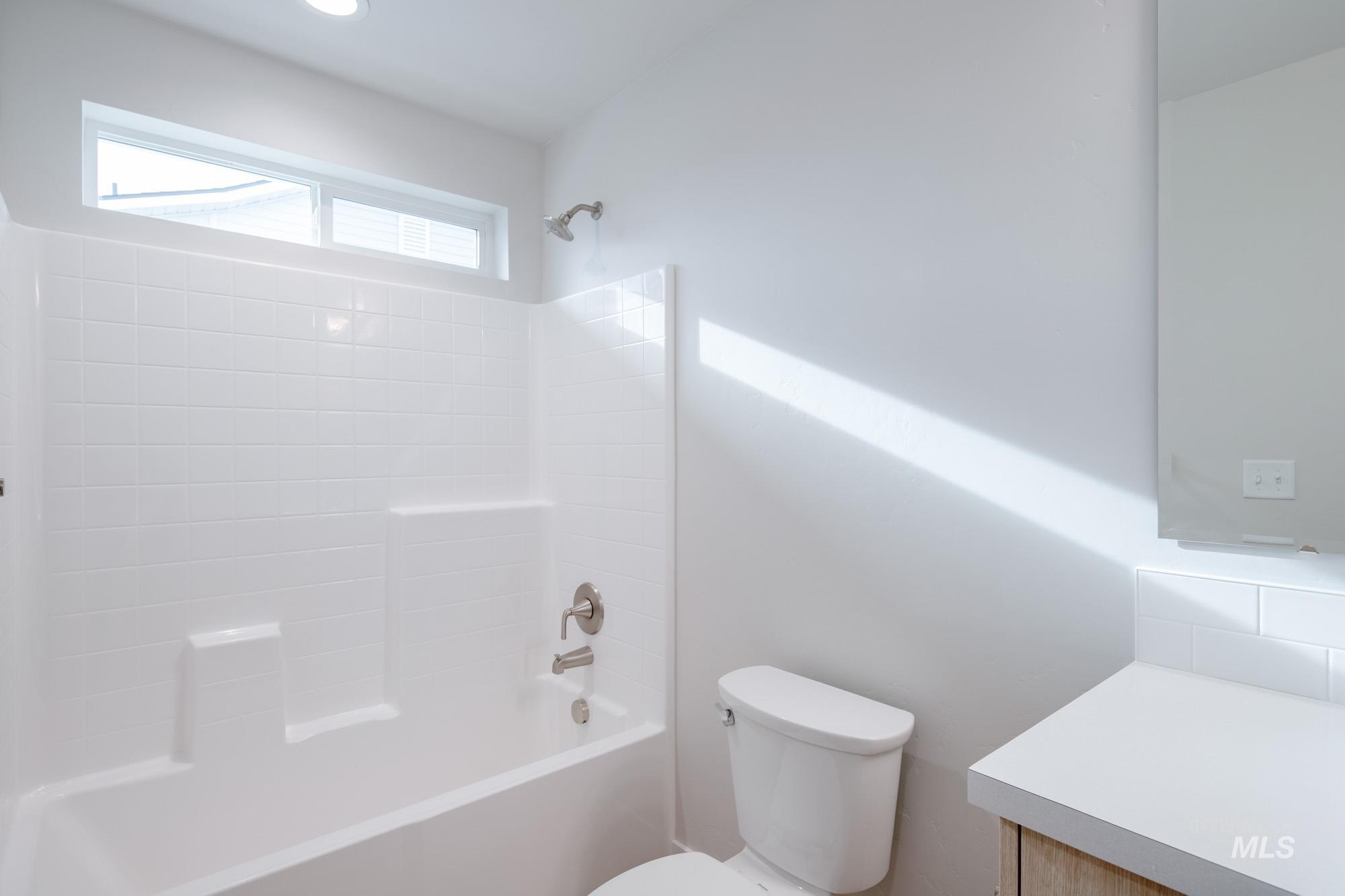 3089 South Maple Rnch Way Nampa, ID 83686 - Photo 20 of 22 Full bathroom featuring vanity and shower combination