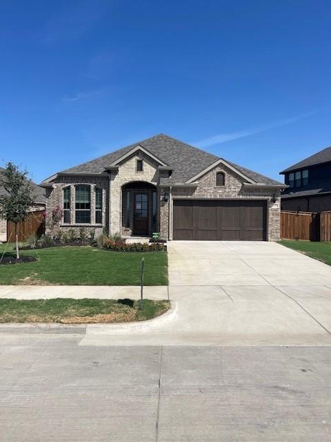 2506 Tilden Lane Mansfield, TX 76084 - Photo 1 of 1 a front view of a house with a yard