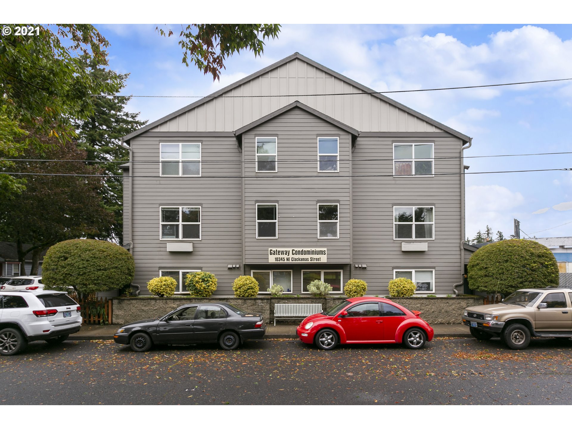 10345 Northeast Clackamas Street, Unit 2 Portland, OR 97220 - Photo 1 of 28 a cars parked in front of a house