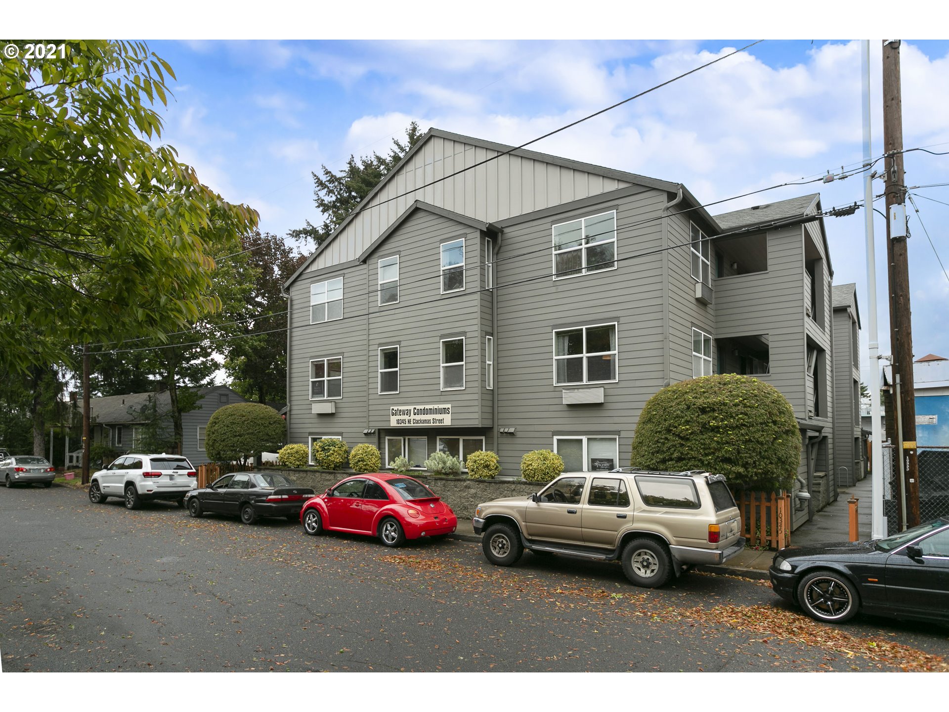 10345 Northeast Clackamas Street, Unit 2 Portland, OR 97220 - Photo 28 of 28 a car parked in front of a house