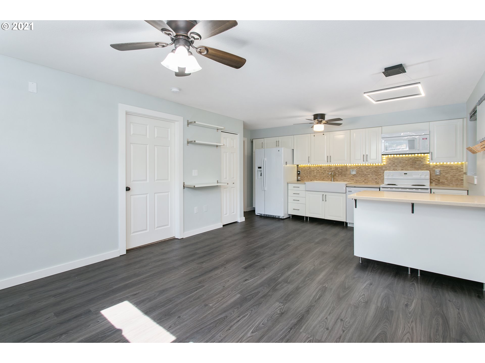 10345 Northeast Clackamas Street, Unit 2 Portland, OR 97220 - Photo 9 of 28 a view interior of the house and kitchen view