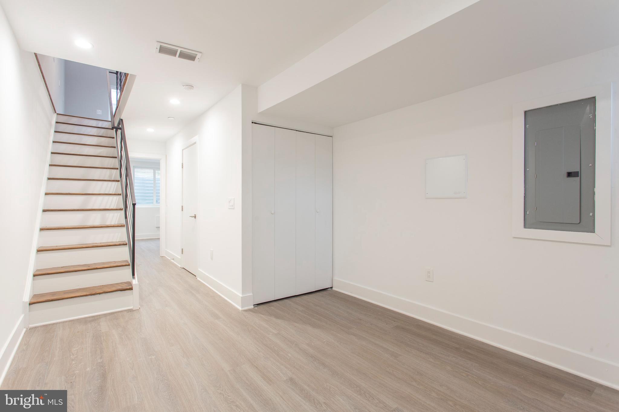 542 Pierce Street Philadelphia, PA 19148 - Photo 27 of 36 a view of a room with wooden floor and entryway