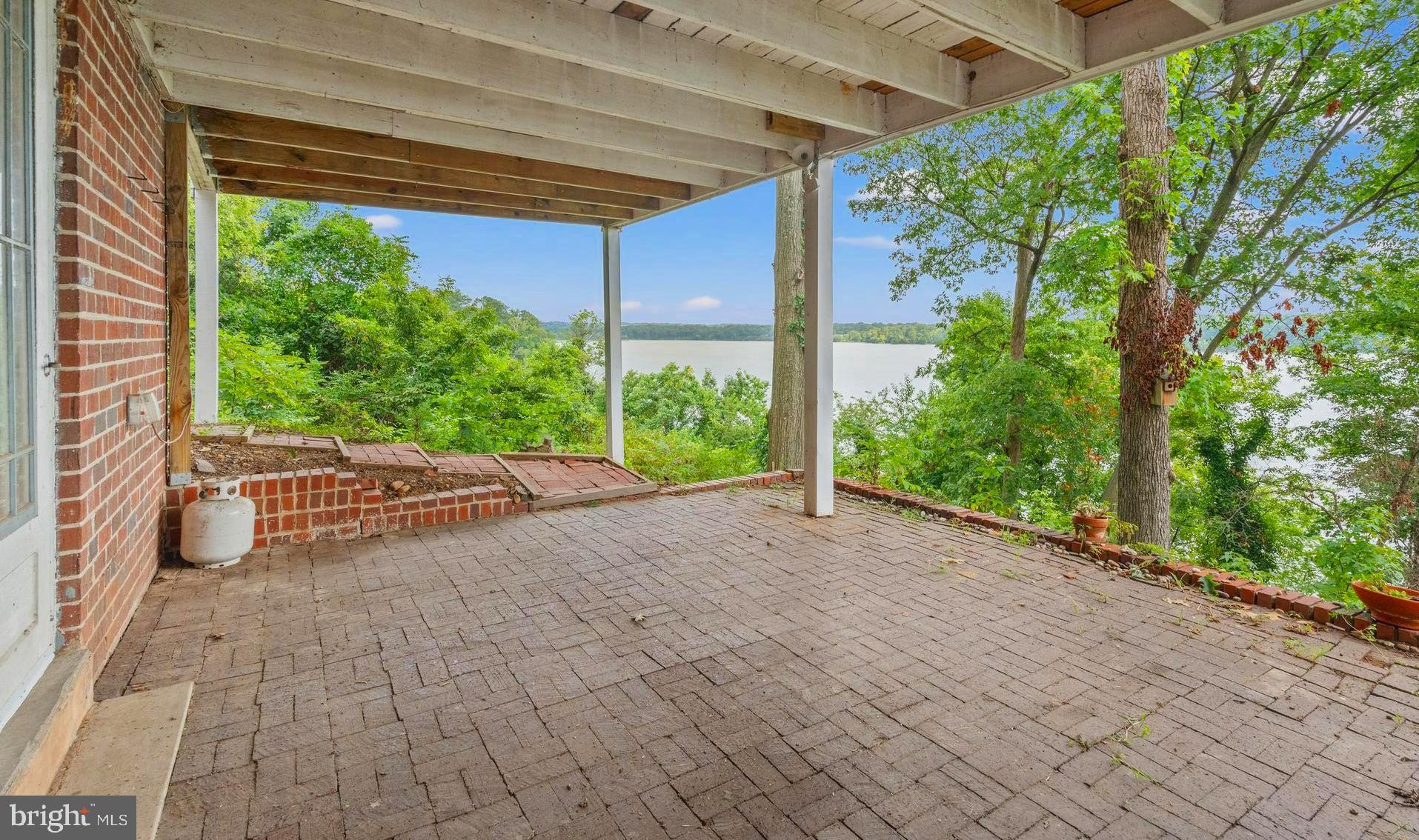 9907 Indian Queen Point Road Fort Washington, MD 20744 - Photo 48 of 52 Covered porch from den