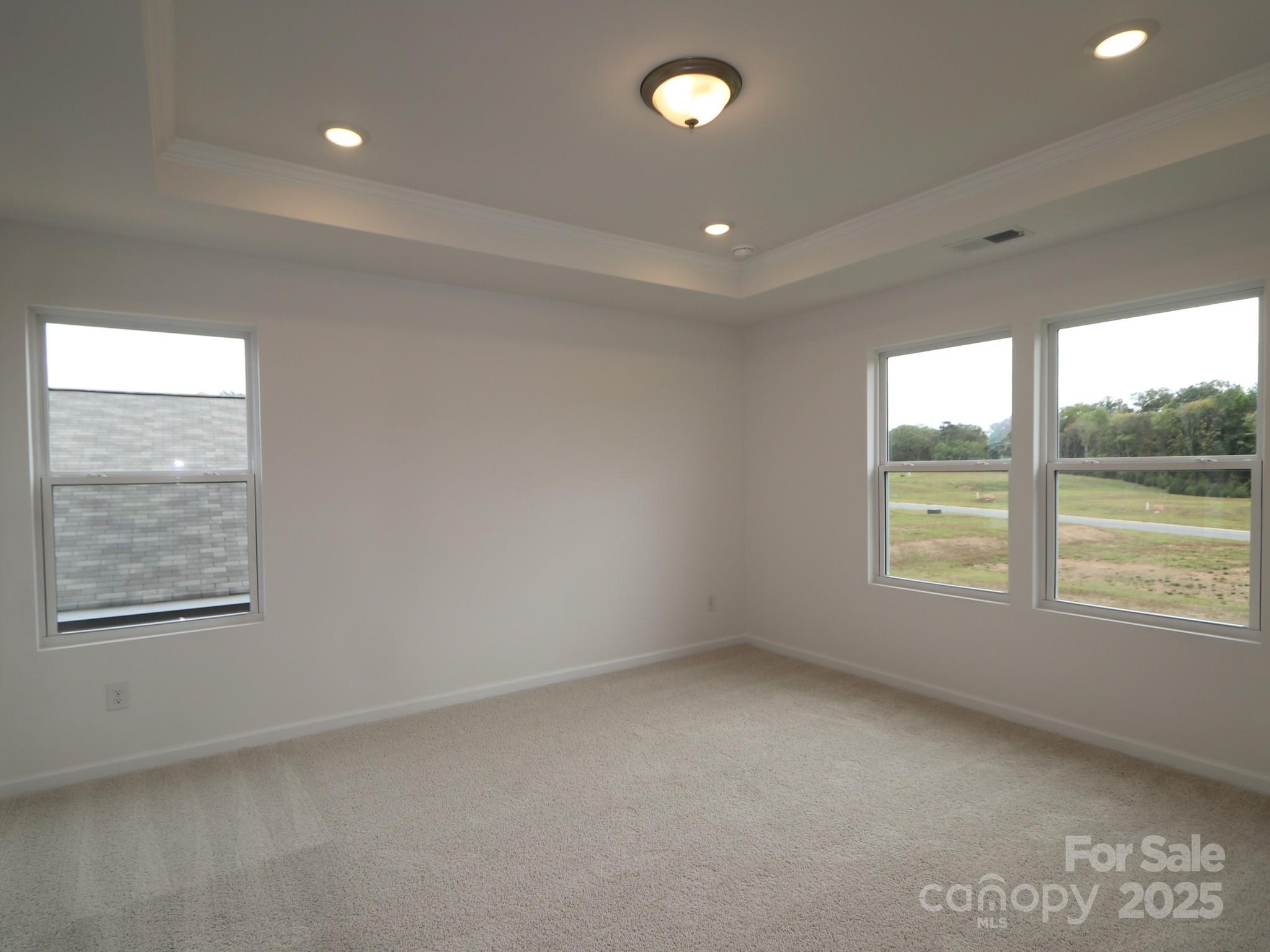 908 Barker Street Monroe, NC 28112 - Photo 13 of 16 a view of an empty room with a window