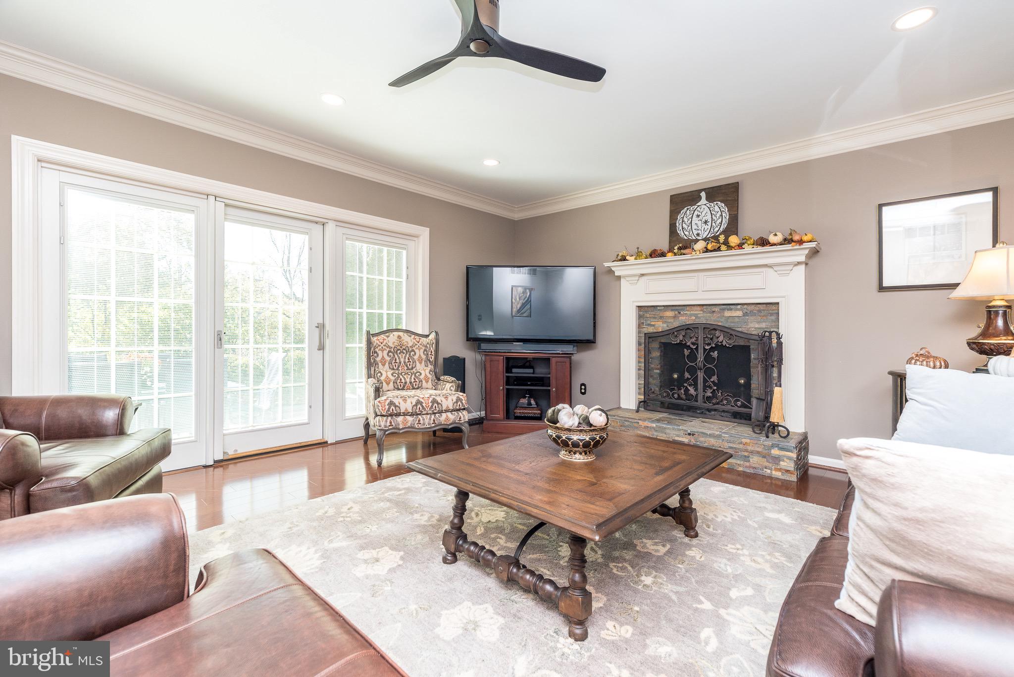 206 Broad Acres Road Lansdale, PA 19446 - Photo 25 of 72 FR with fireplace and access to patio
