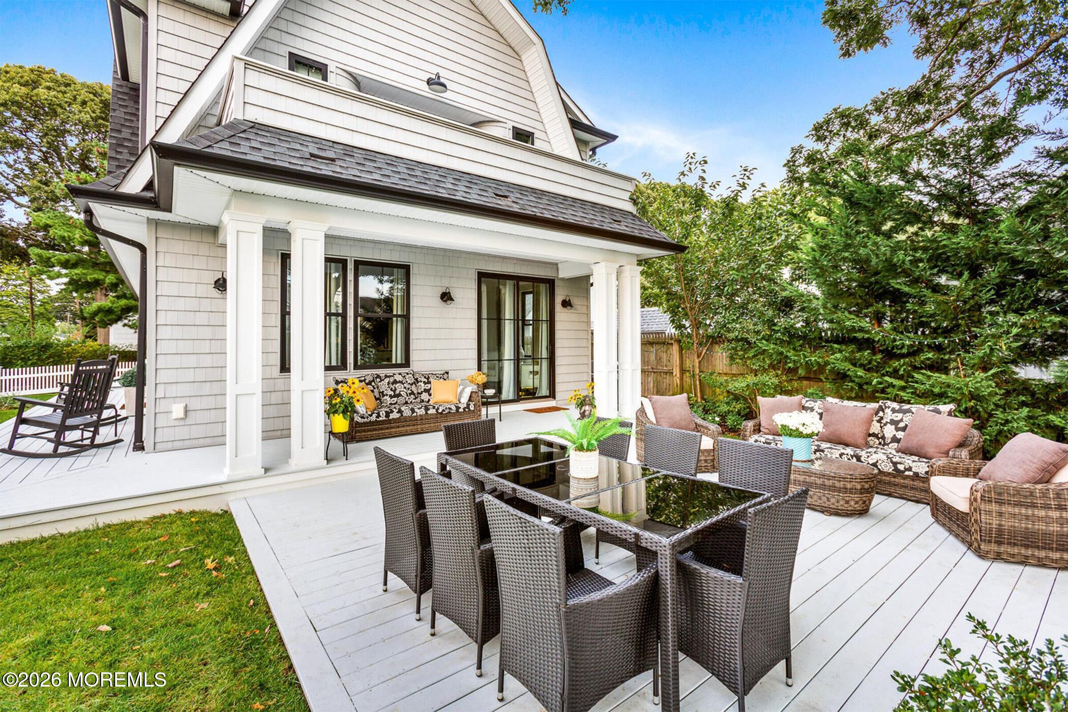 1320 Charles Street Point Pleasant, NJ 08742 - Photo 38 of 41 a view of a dinning table and chairs in the patio