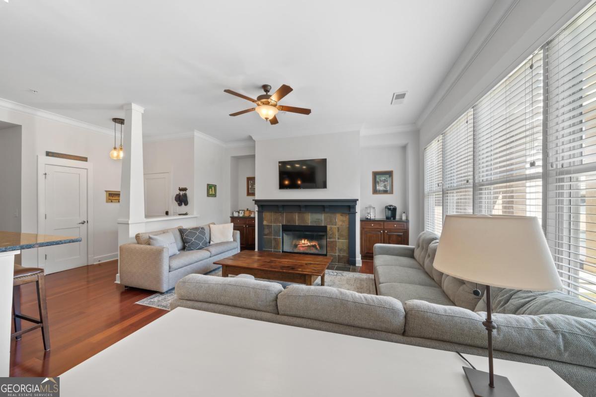 129 South Bay Road Eatonton, GA 31024 - Photo 14 of 45 a living room with furniture and a fireplace