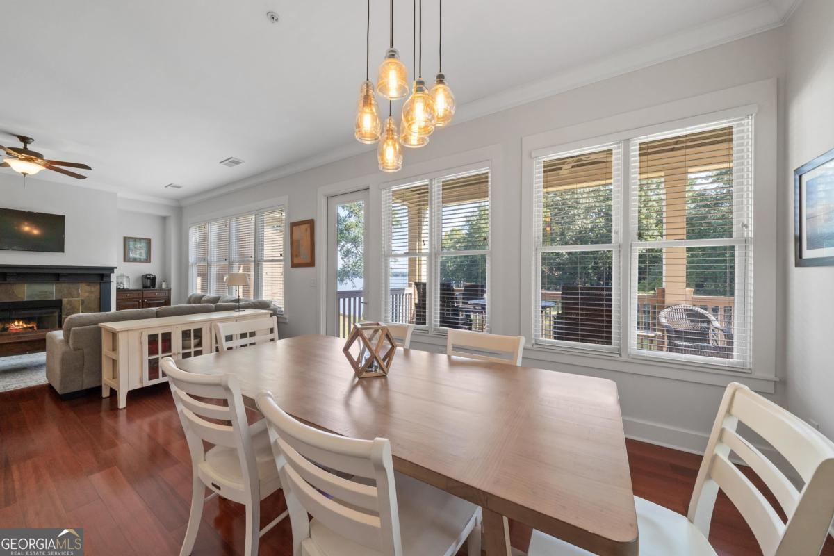 129 South Bay Road Eatonton, GA 31024 - Photo 17 of 45 a view of a dining room with furniture window and wooden floor