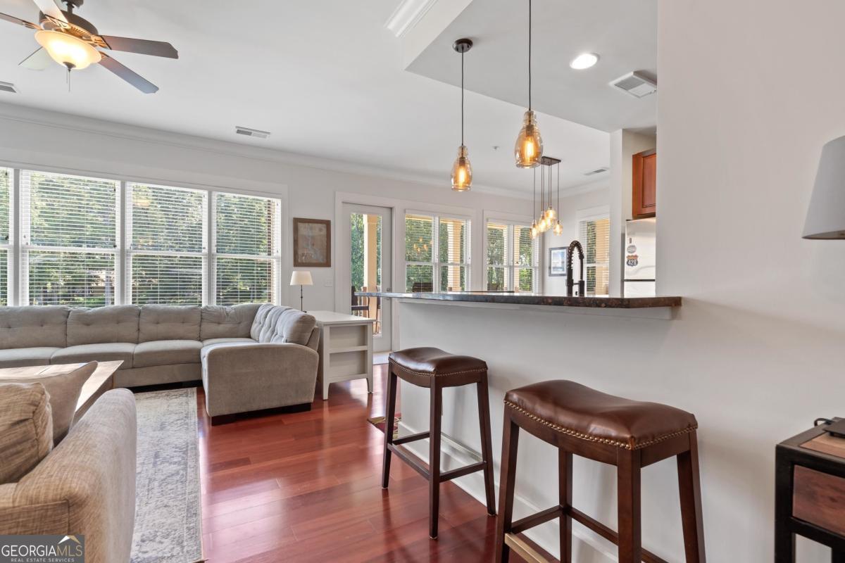 129 South Bay Road Eatonton, GA 31024 - Photo 28 of 45 a dinning room and kitchen with a table chairs