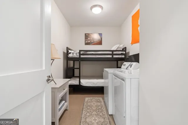 a view of livingroom with washer and dryer