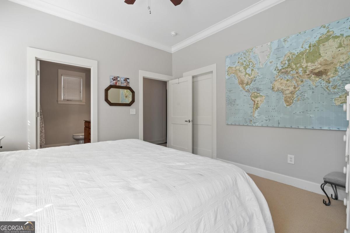 129 South Bay Road Eatonton, GA 31024 - Photo 32 of 45 a bedroom with a bed and a window