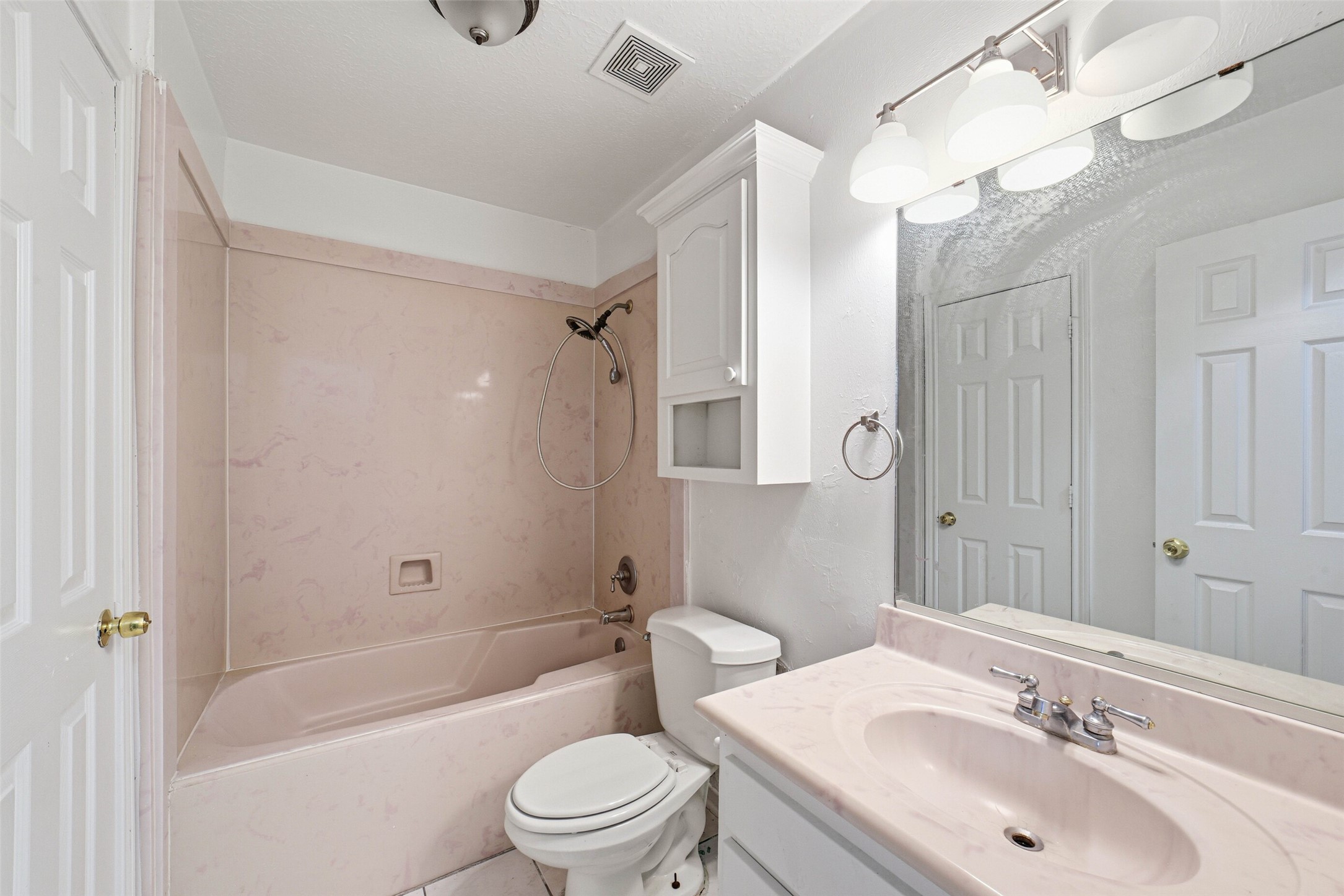 2406 Joel Wheaton Road Houston, TX 77077 - Photo 25 of 36 a bathroom with a sink toilet and shower