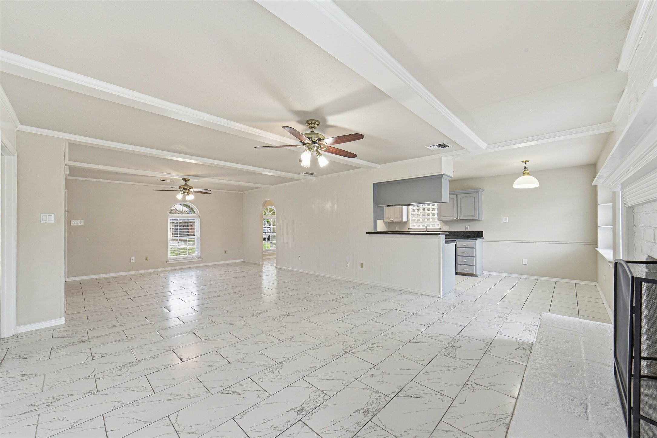 2406 Joel Wheaton Road Houston, TX 77077 - Photo 8 of 36 a view of a kitchen with a sink and a refrigerator