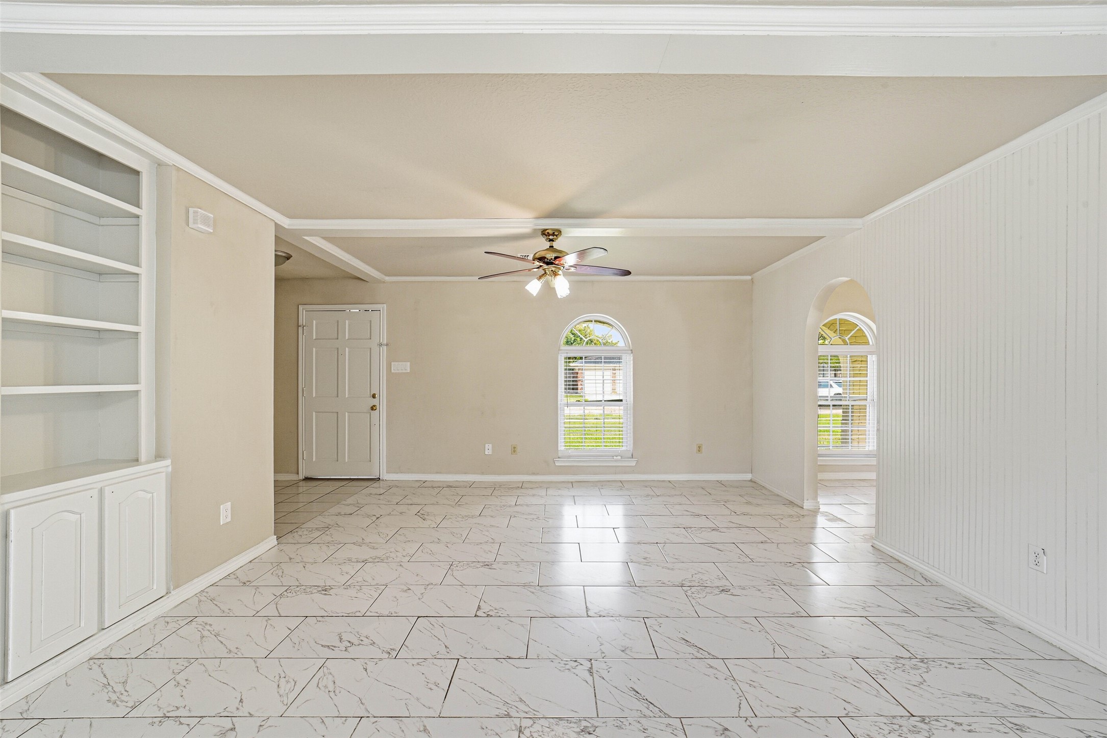 2406 Joel Wheaton Road Houston, TX 77077 - Photo 9 of 36 a view of an empty room with a window