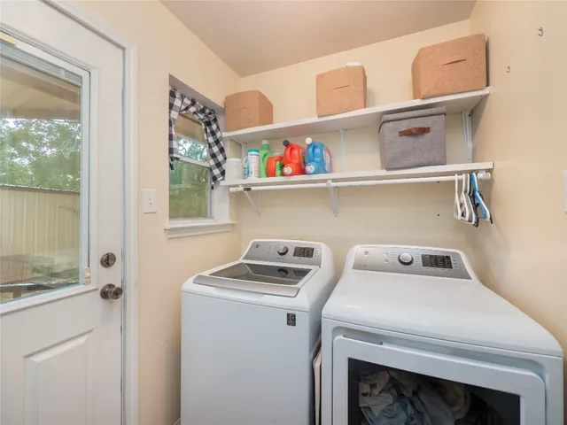 a utility room with dryer and washer