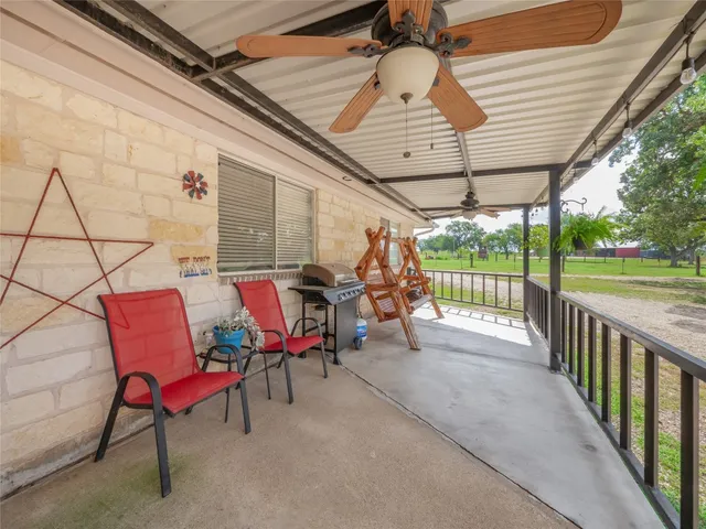 a view of a chairs in the balcony