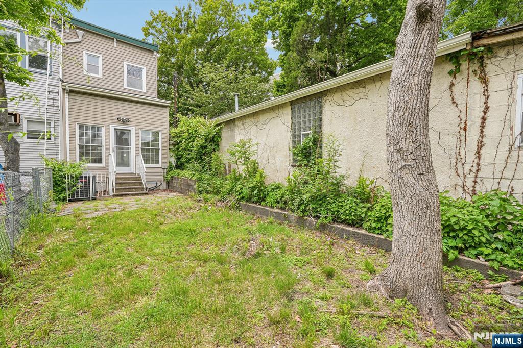 90 A Hackensack Plank Road Weehawken, NJ 07086 - Photo 31 of 40 front view of a house with a yard