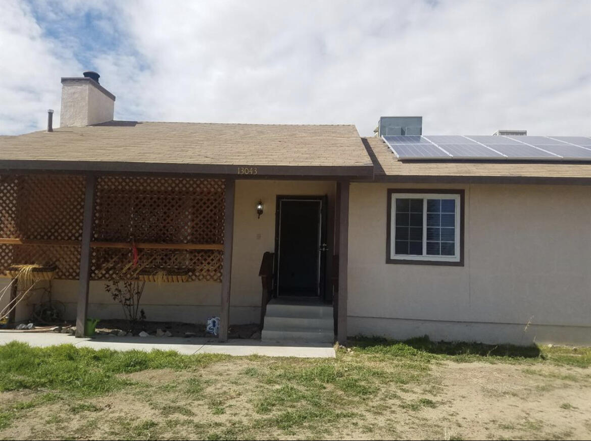 13043 Clement Street North Edwards, CA 93523 - Photo 4 of 4 a house view with a garden