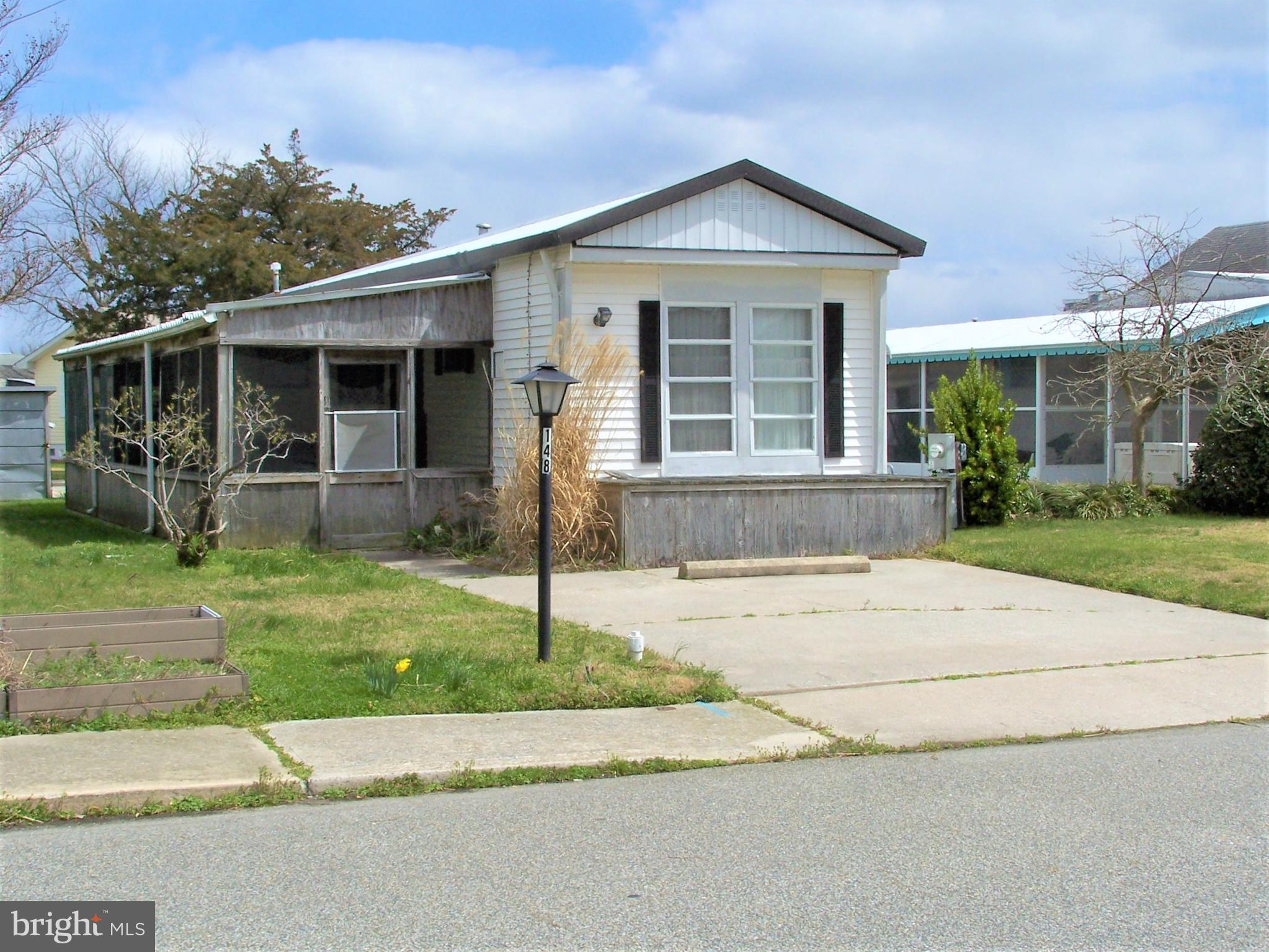 148 Pine Tree Road Ocean City, MD 21842 - Photo 1 of 31 Left Front Elevation