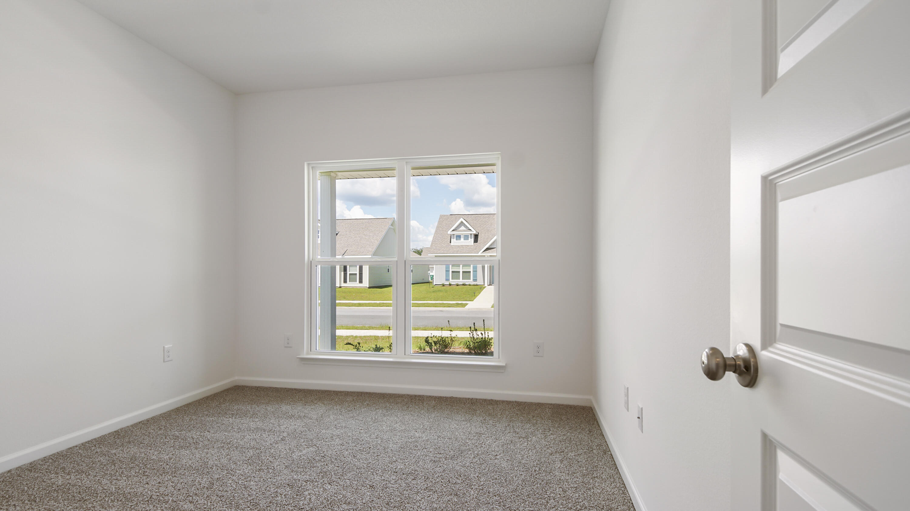 216 Huckleberry Street Freeport, FL 32439 - Photo 25 of 32 an empty room with windows