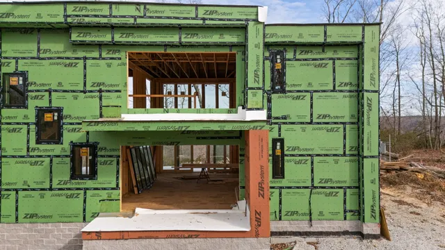 a view of a back yard of a house