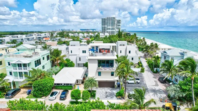 a view of swimming pool with outdoor seating space