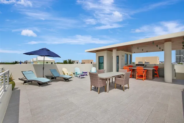 a kitchen with stainless steel appliances granite countertop a stove and a sink