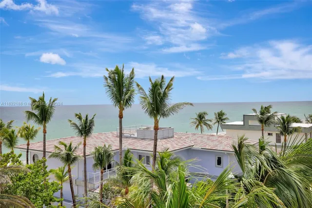 a view of staircase with lots of frames and windows