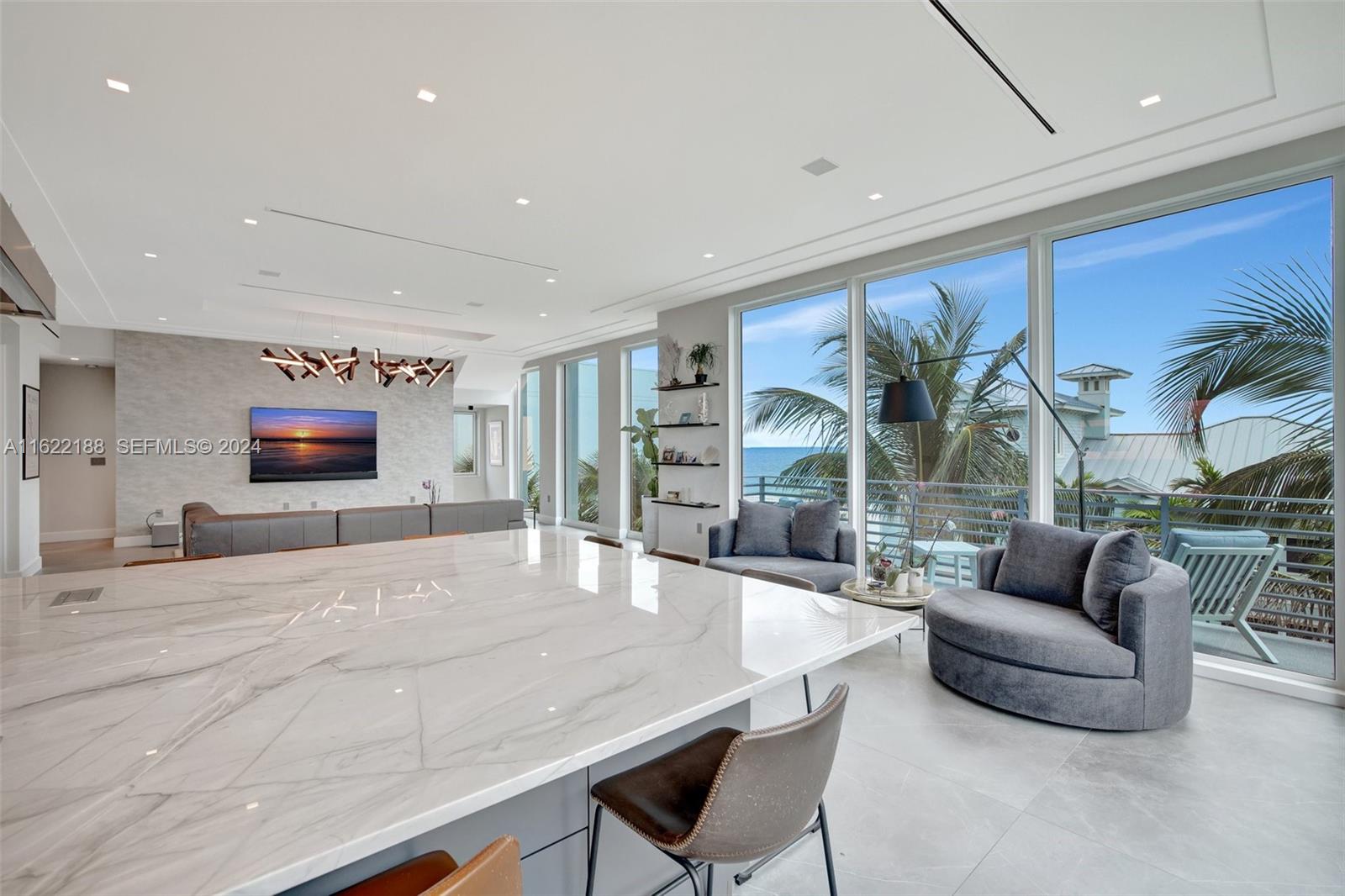 305 Oak Street Hollywood, FL 33019 - Photo 44 of 97 a living room with furniture and a flat screen tv