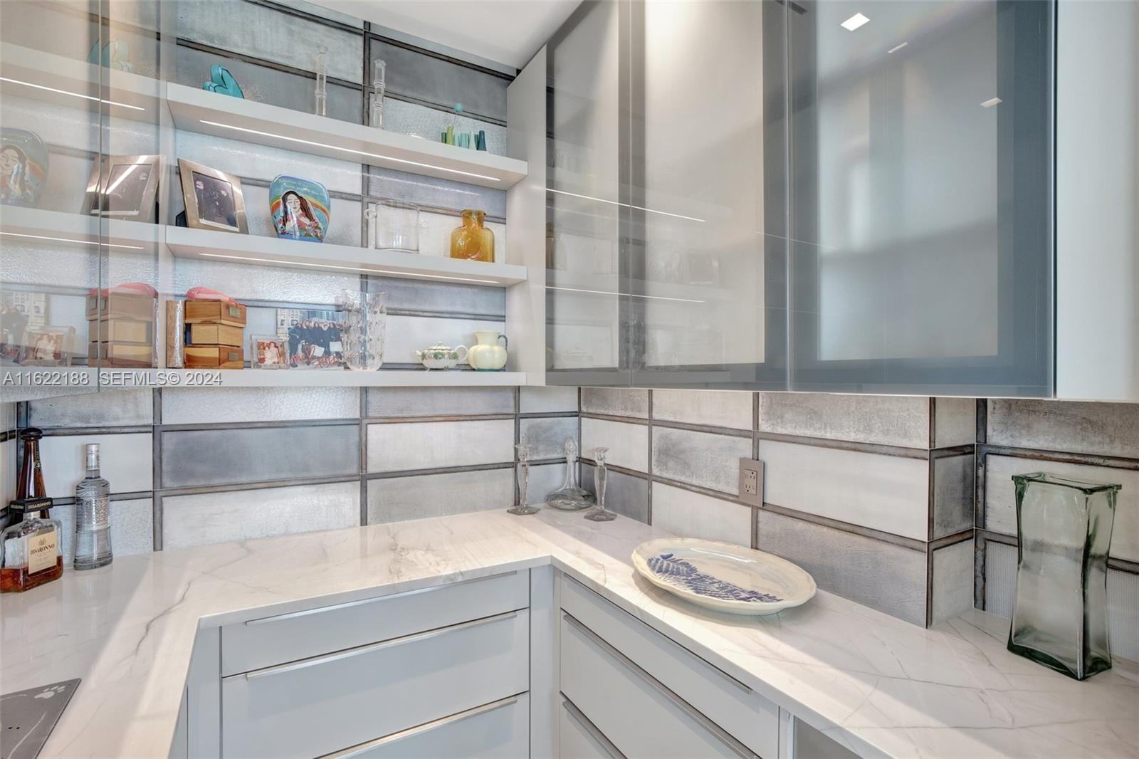 305 Oak Street Hollywood, FL 33019 - Photo 53 of 97 a kitchen with a sink and a cabinets