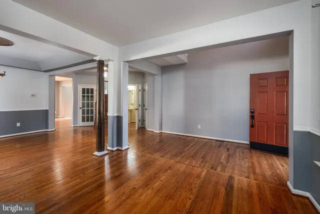 a view of a livingroom with wooden floor