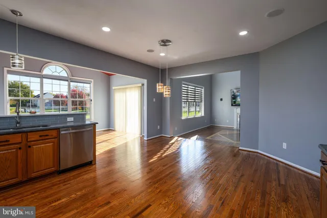 a view of a hallway with windows